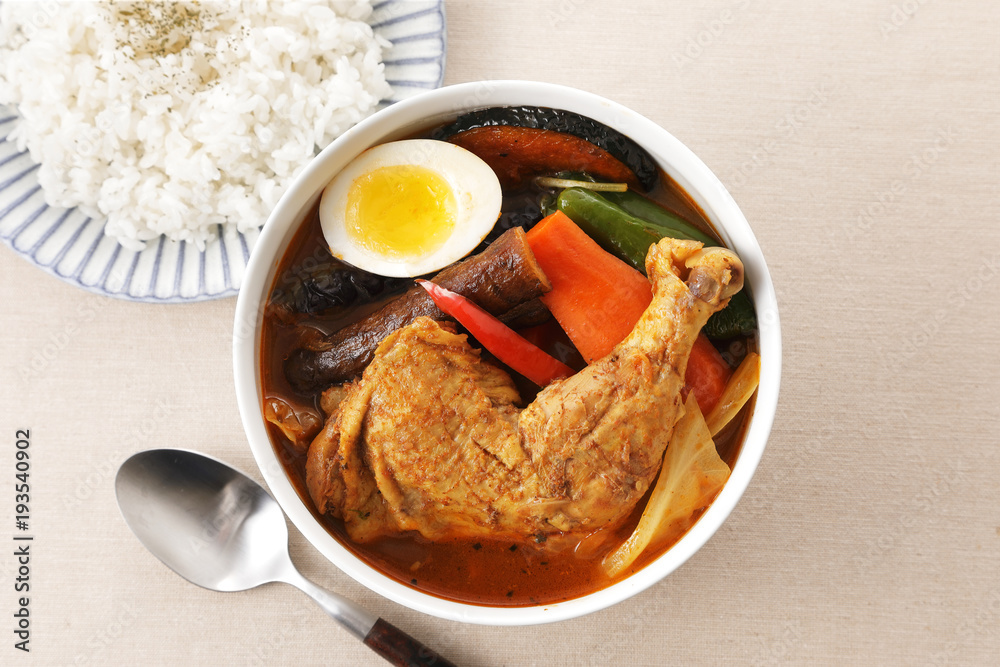 スープカレー。定番化と多様化で具材はマチマチになった。